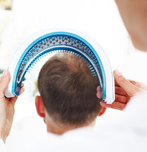 Trycholog Wrocław fototerapia laserowa włosów HAIRMAX
